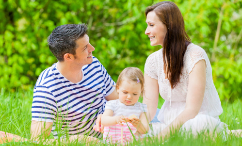 We cover all the medical needs for you whole family for baby to grandparent family relaxingtogether on picnic blanket